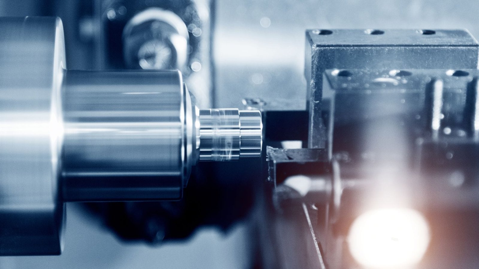 A part being machined on a CNC lathe