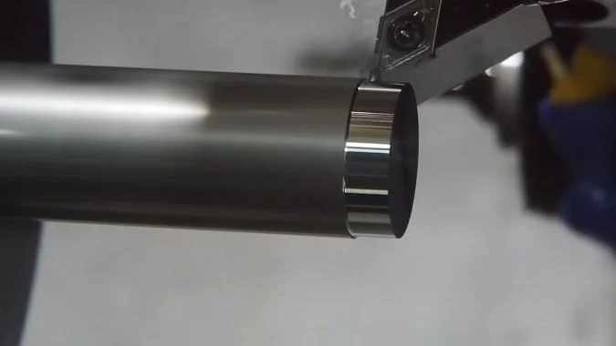 Turning tool cutting workpiece