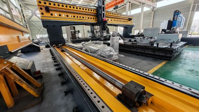 Closeup of CNC gantry drilling machine frame