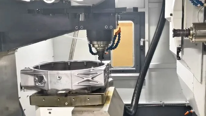 Vertical-horizontal machining center working on a workpiece