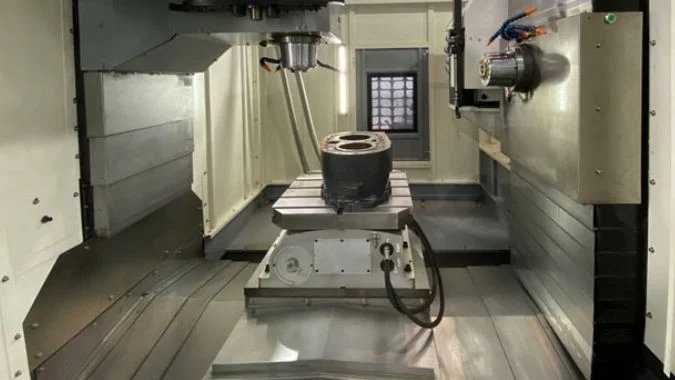 A vertical-horizontal CNC machining center inside view