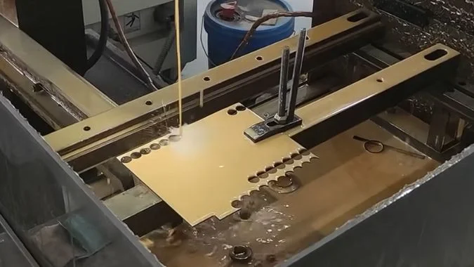 MS-WEDM working on a metal plate