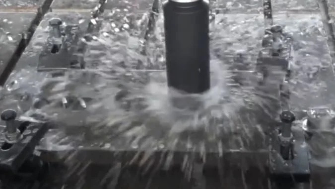 Coolant During CNC Drilling CNC drilling with coolant directed at the cutting zone