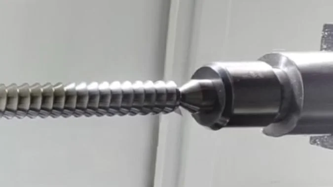 Center Support for a Long Screw Center support holding a long screw at its center point