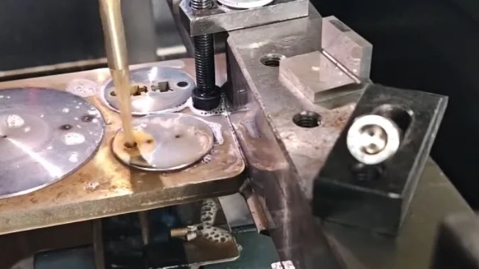 MS-WEDM machine operating during workpiece machining