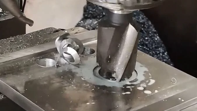 CNC milling machine performing hole machining