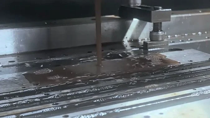 MS-WEDM machine during a wire-cutting operation