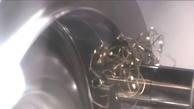 Long turning chips wrapping on tool