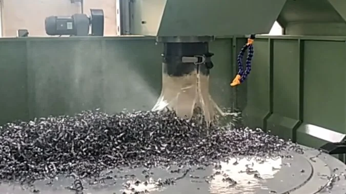 Positioning Before CNC Drilling CNC drill entering a metal plate at a prepared spot