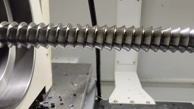 Finished Thread on a Lead Screw Finished helical thread on a whirled lead screw