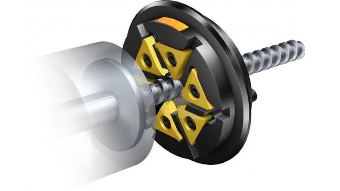 Thread whirling illustration showing insert engagement around an externally threaded shaft